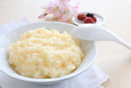 Japanese food, egg porridge and Umeboshi Plumの写真素材