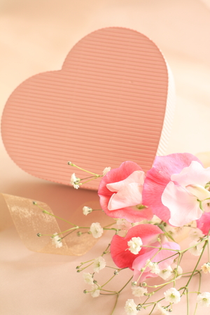 heart shaped gift box and flowerの写真素材