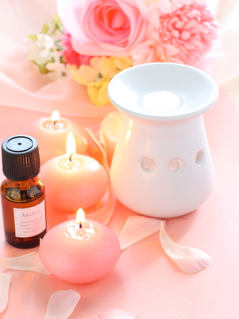 ranunculus and aroma candleの写真素材