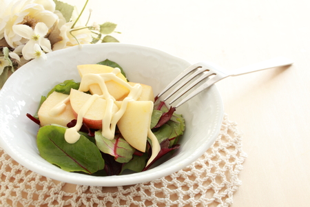 apple salad and flowerの写真素材