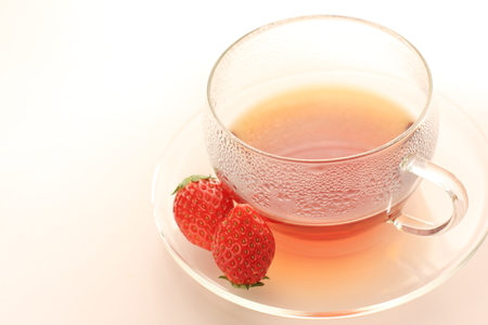 English tea and strawberry with cake on backgroundの写真素材