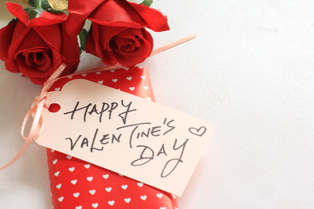 artificial rose and hand written card for valentine's day imageの写真素材