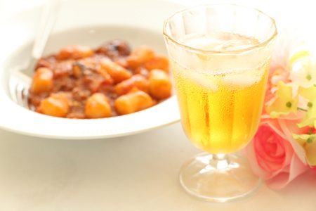 iced tea and octopus gnocchiの写真素材