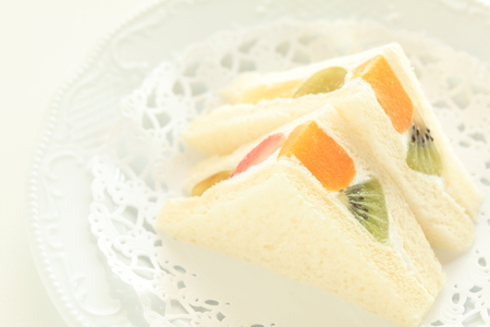 homemade fruit and cream sanwich and teaの写真素材