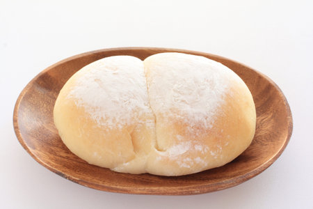bread on wooden plate with copy space
