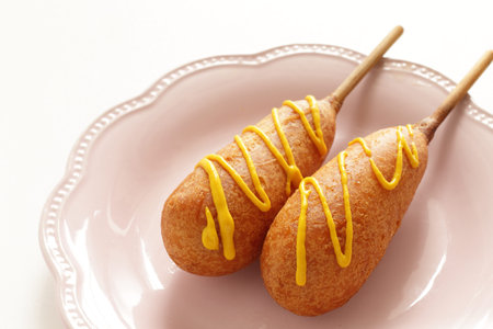 corn dog and mustard sauce