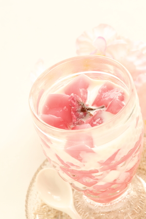 Sakura jelly and milk in glass for Japanese spring food imageの写真素材