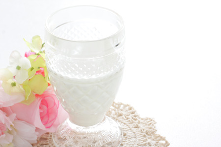 iced yogurt drink with flowerの写真素材