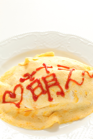 Ketchup on omelet MOE means blooming for food imageの写真素材