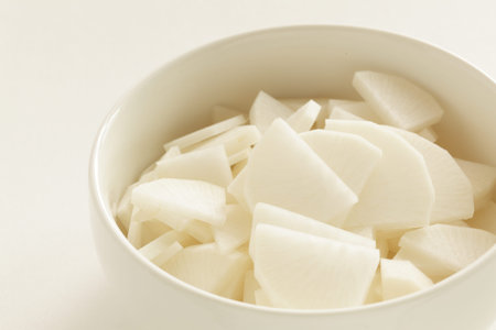 Sliced radish daikon with copy spaceの写真素材