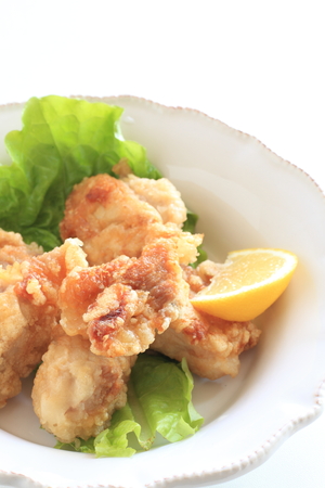 Homemade fried chicken served with lemonの写真素材