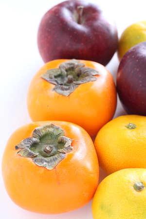 Japanese Persimmon and apple for autumn fruit imageの写真素材