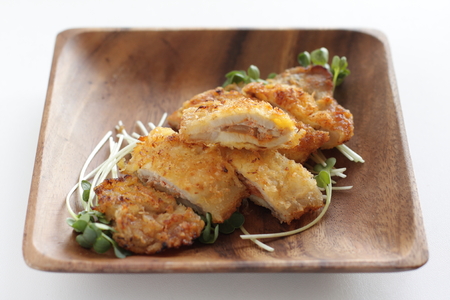 Japanese food, chopped pork cutlet on wooden plateの写真素材