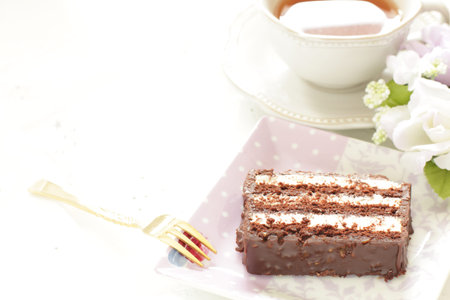 Homemade chocolate cake and tea