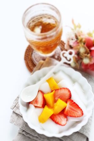 Chinese food, mango almond tofu and strawberryの写真素材