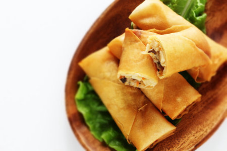 Chinese food, spring roll on wooden plate