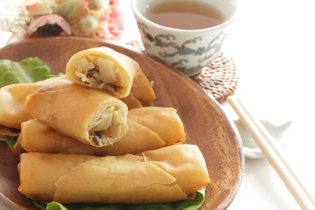 Chinese food, spring roll on wooden plate