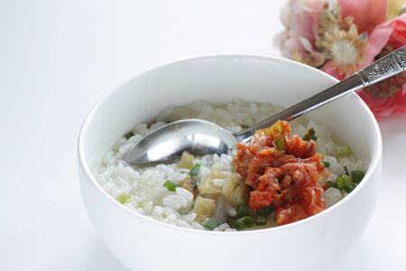 Korean food, cod fish and kimchi in soup riceの写真素材