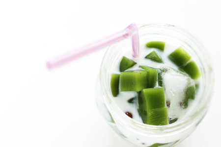 Green tea jelly and red bean in coconut milk