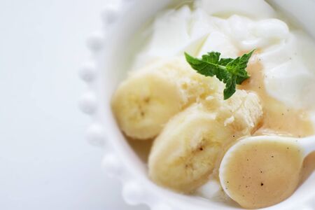 Vanilla Condense milk and Banana yogurt for healthy dessertの写真素材