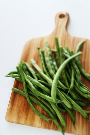 green bean on wooden board with copy spaceの写真素材