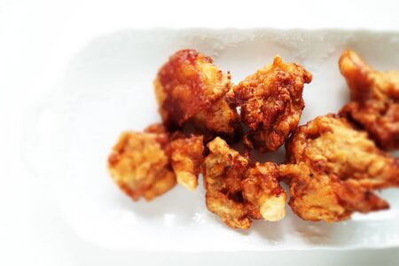 Homemade fried chicken on white dishの写真素材