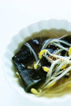 Korean food, seaweed and soy sprout soup with sesame seed on topの写真素材