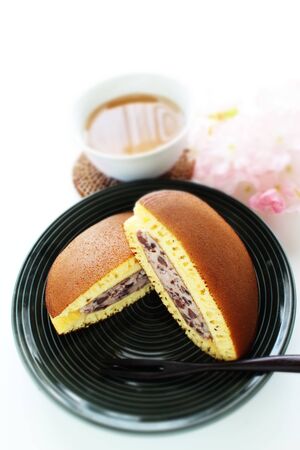 Japanese confectionery, half cut Dorayaki wagashi on dishの写真素材
