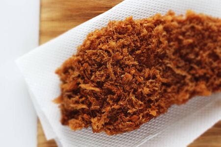 Japanese food, pork cutlet Tonkatsu on boardの写真素材