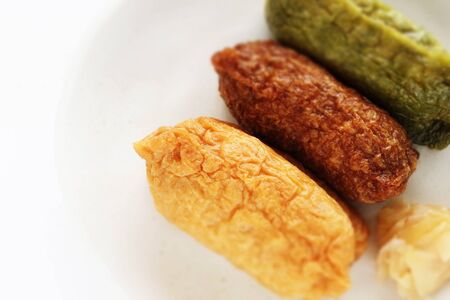 Japanese food, assorted inari-zushi rice and tofu skin on dishの写真素材
