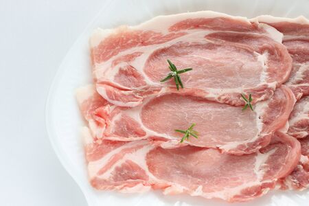 Freshness sliced pork and rosemary herbal for cooking ingredientの写真素材