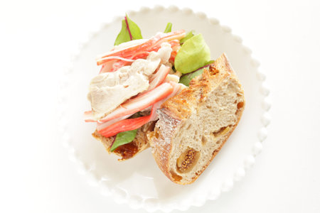 Homemade fig French bread and crab stick chicken sandwichの写真素材