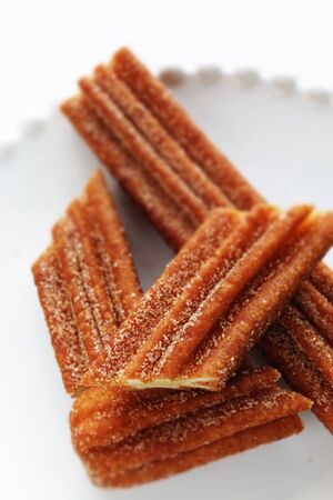 Sweet food Churro on dish for fast food dessert Churroの写真素材