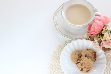 Chocolate cookie on white dish with copy space