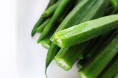 Healthy food, boiled okra in white background with copy spaceの写真素材