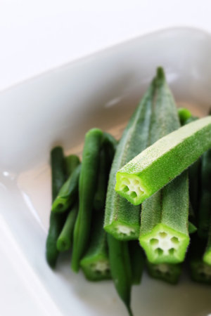 Healthy food, boiled okra in white background with copy space