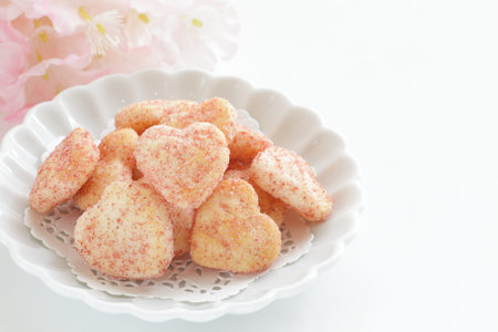 Japanese food, heart shaped pink rice cracker on dish