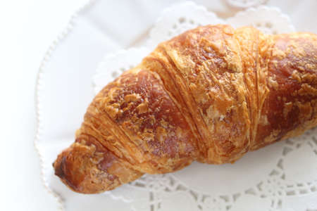 Croissant bread on dish with copy spaceの写真素材