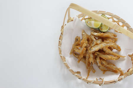 Japanese food, small fish tempura served with limeの写真素材