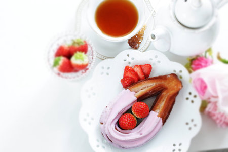 strawberry coating churros on dish for spring sweet food