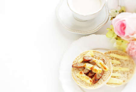 Homemade cheese and sausage in English muffin sandwichの写真素材
