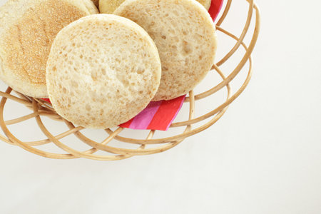 English muffin in bread basket for breakfast