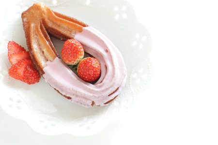 strawberry coating churros on dish for spring sweet food