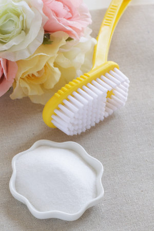 Yellow brush on linen with flower