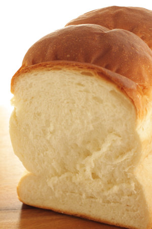 close up loaf bread on white background