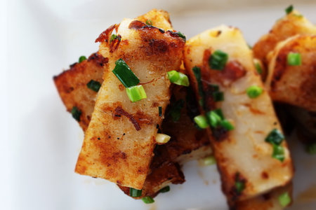 Chinese dumpling, Turnip cake on plate with copy spaceの写真素材
