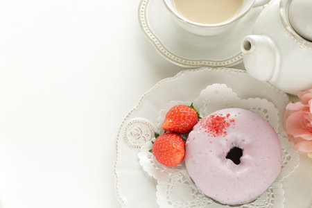 Strawberry chocolate coating donut on with berry for  gourmet dessertの写真素材