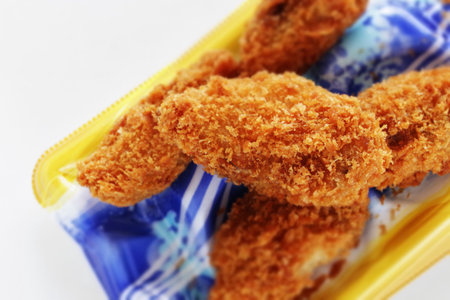 Deep fried oyster and bread crumbs on food container