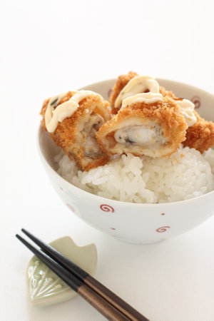 Japanese autumn gourmet, deep fried oyster in half showing cross sectionの写真素材