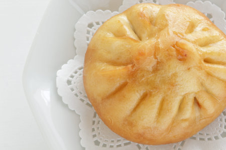 Chinese food, deep fried meat pork bun on dishの写真素材